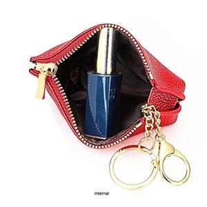 Internal view of red leather coin purse showing interior capacity for lipstick and keys