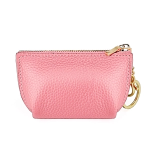Detail of pink pebbled leather coin purse with golden zipper and keychain ring attachment