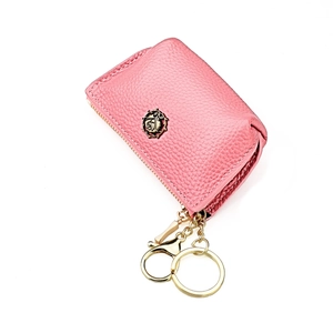 Pink pebbled leather coin purse featuring a vintage gold rose and a spring clip keychain