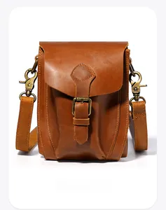 Front view of retro crazy horse leather crossbody bag with vintage bronze metal buckle
