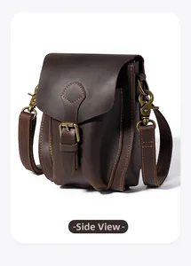 Side view of retro brown crazy horse leather messenger bag with vintage brass buckle
