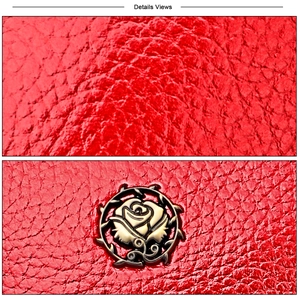 Macro view of red lychee grain leather texture and vintage metal rose emblem detail
