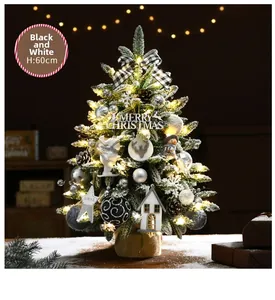 Detail of 60cm tabletop Christmas tree with black and white bows and pine cones