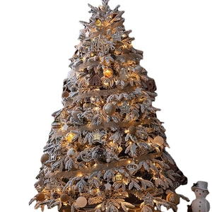 Frosted artificial Christmas tree with snow effect, warm LED lights and snowman decor