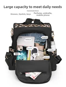 Detail of waterproof nylon leopard print backpack showing high-capacity interior storage