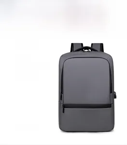 Detail view of business backpack with USB charging port and waterproof fabric design