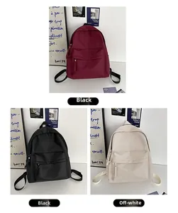 Detailed comparison of red, black, and beige minimalist backpacks for women