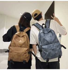Minimalist vintage backpacks in brown and blue with large capacity and front pockets