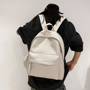Minimalist ivory PU leather backpack featuring wide shoulder straps and long zipper pulls
