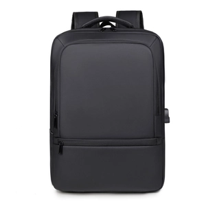 Minimalist black waterproof business backpack with USB charging port and ergonomic straps
