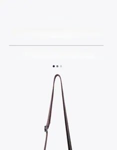 Adjustable woven nylon shoulder strap for crossbody bags with silver metal buckle detail