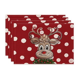 Set of 4 red linen Christmas placemats featuring a festive reindeer and white polka dots
