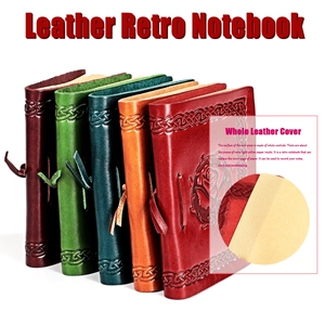 Detail view of Celtic embossed patterns on retro cowhide leather notebook covers