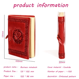 Detailed view of red cowhide notebook featuring embossed rose pattern and dimensions