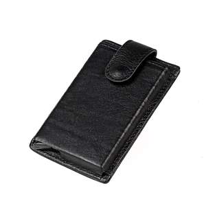 Close-up of black lychee texture leather wallet with secure snap closure and fine stitching