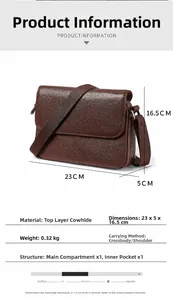 Detail view of deep brown veg-tan leather crossbody bag with dimensions 23x5x16.5cm