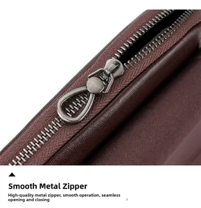 Detail of smooth gunmetal zipper and high-quality vegetable-tanned leather on crossbody bag