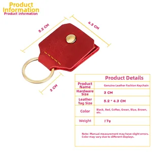 Detail of red leather keychain case with brass hardware showing size 5.2x4.3cm specs