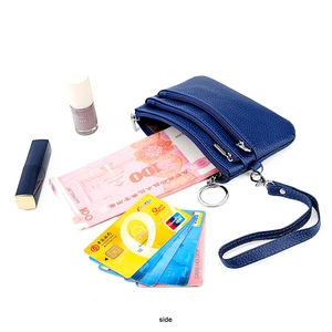 Blue pebbled leather triple-zipper wallet with wrist strap and key ring attachment