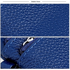 Close-up of navy blue lychee grain leather wallet with contrast light blue stitching