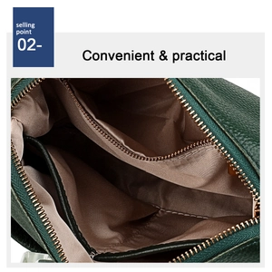 Internal view of the genuine leather bag showing multi-compartment storage and zippers