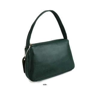 Side view of dark green lychee grain leather underarm bag with top zipper detail