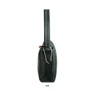 Side view of dark green pebbled leather shoulder bag showing thick structure and strap