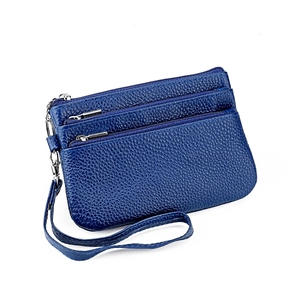 Dark blue litchi pattern leather wristlet wallet with three zipper compartments