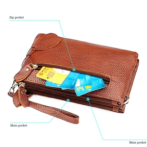 Brown leather clutch bag with multiple zip pockets and internal functional compartments