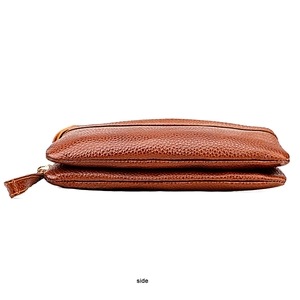 Side view of brown genuine leather bag with pebble grain texture and double zipper detail