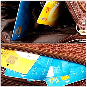 Internal view of leather crossbody bag showing card slots and zipper pocket organization