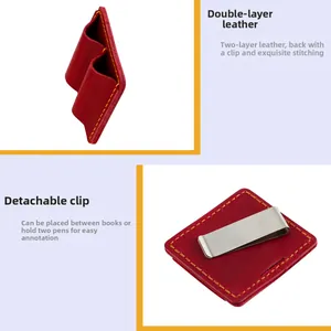 Detail of red leather pen holder with yellow stitching and removable metal clip