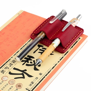 Dual pen sleeve made of crazy horse leather in burgundy with stainless steel clasp