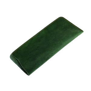 Close-up of vintage dark green crazy horse leather glasses pouch with orange stitching