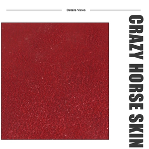Detailed macro texture of red crazy horse leather with natural matte grain finish
