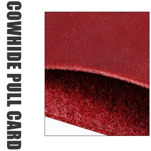 Macro shot of dark red cowhide leather showing the premium matte grain and fiber texture