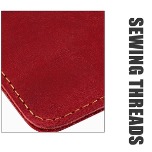 Close-up of red crazy horse leather eyewear pouch with yellow contrast hand-stitching