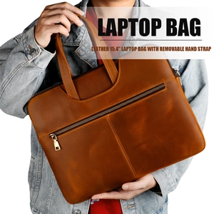 Detail of 15.4-inch brown crazy horse leather laptop bag with removable strap
