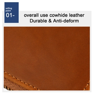 Close-up of brown cowhide leather key case showing natural texture and durable stitching