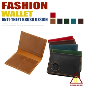 Detail view of leather passport wallet with AirTag holder and anti-theft RFID blocking