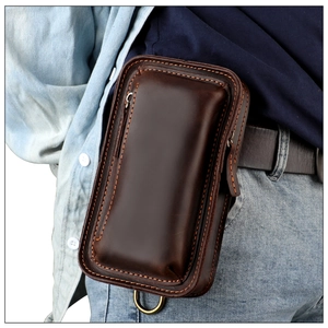 Detailed view of genuine dark brown leather phone holster bag with orange stitching detail
