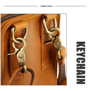 Macro shot of crazy horse leather phone pouch with antique bronze keychain hook and zipper