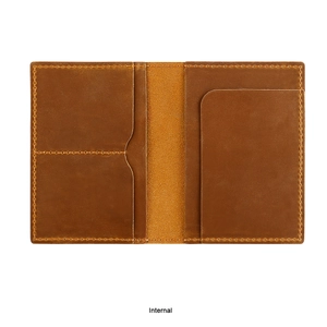 Internal view of brown leather passport holder with card slots and yellow stitching
