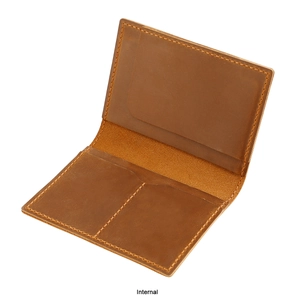 Detail view of genuine leather passport cover interior with AirTag holder and card slots