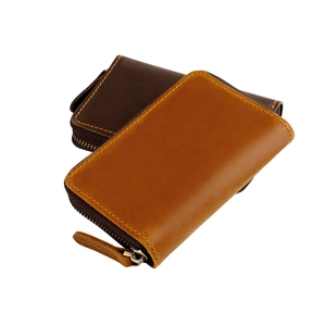 Genuine leather zipper key wallet with handmade stitching and metal zipper in tan and brown