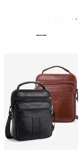 Detailed view of men's leather crossbody bags in black and brown with lychee texture