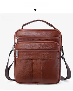 Front view of brown pebble grain leather crossbody bag with multiple zipper pockets