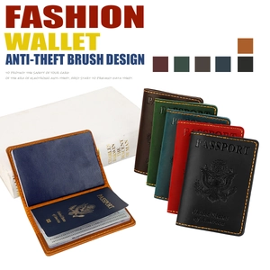 Detail of leather passport covers with RFID protection and classic eagle crest engraving