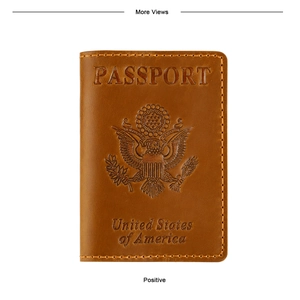 Close-up of tan leather passport cover featuring embossed US Great Seal and neat stitching