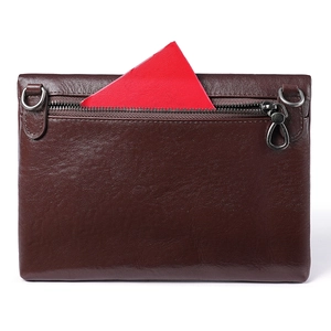 Sac bandoulière en cuir tanné végétal marron foncé avec poche zippée arrière et boucles en D